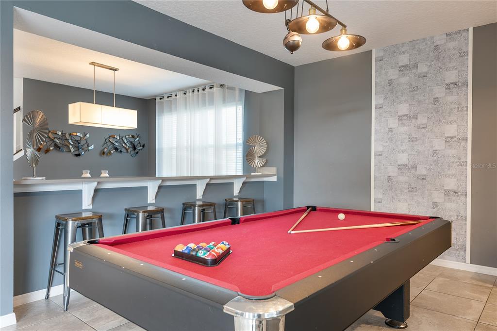 8900 Caroline Bay Court Kissimmee, FL 34747 - Photo 10 of 62 a room with pool table and window
