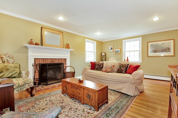 3 Tyler Road Boxford, MA 01921 - Photo 5 of 30 a living room with furniture and a fireplace