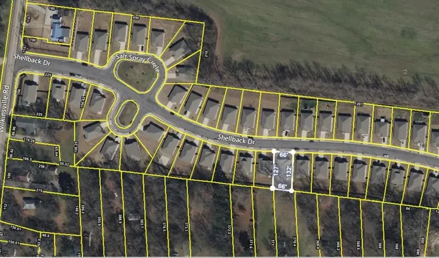 a view of a blue building with large windows