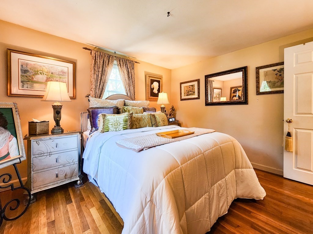 12 Peaceful Lane Wareham, MA 02538 - Photo 14 of 41 a bed room with a bed and a window