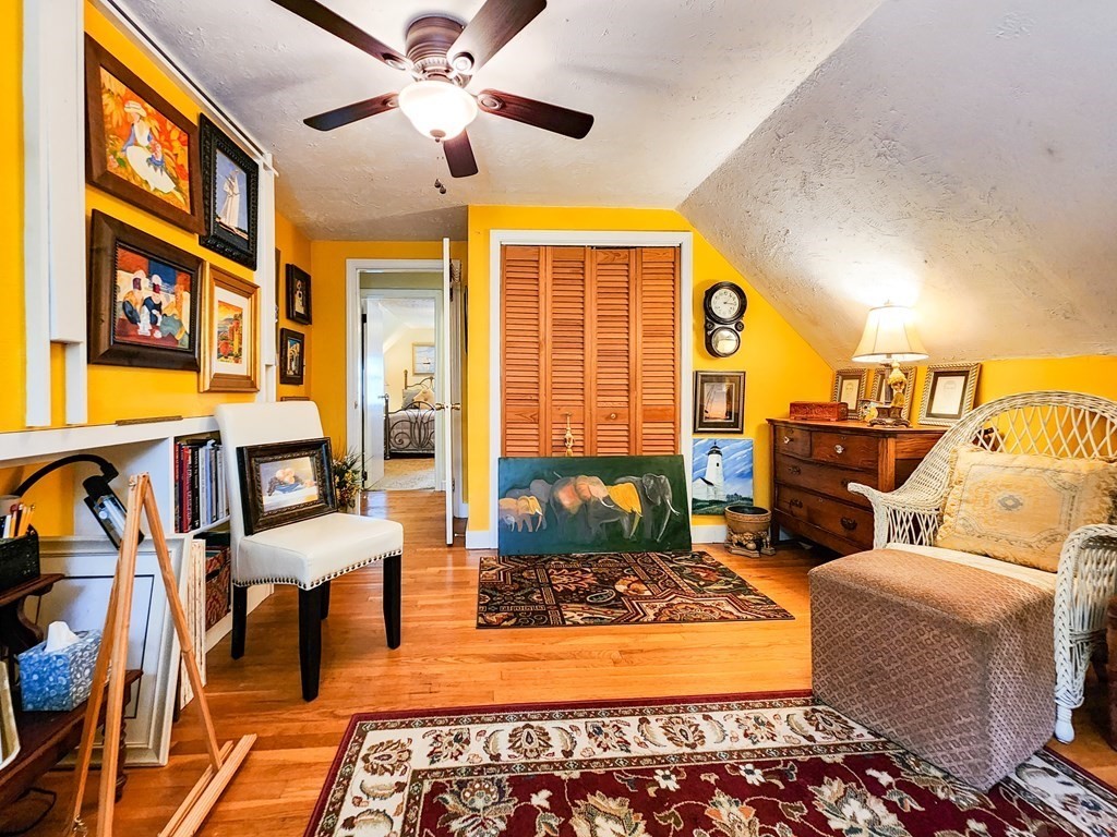 12 Peaceful Lane Wareham, MA 02538 - Photo 21 of 41 a living room with furniture and a rug