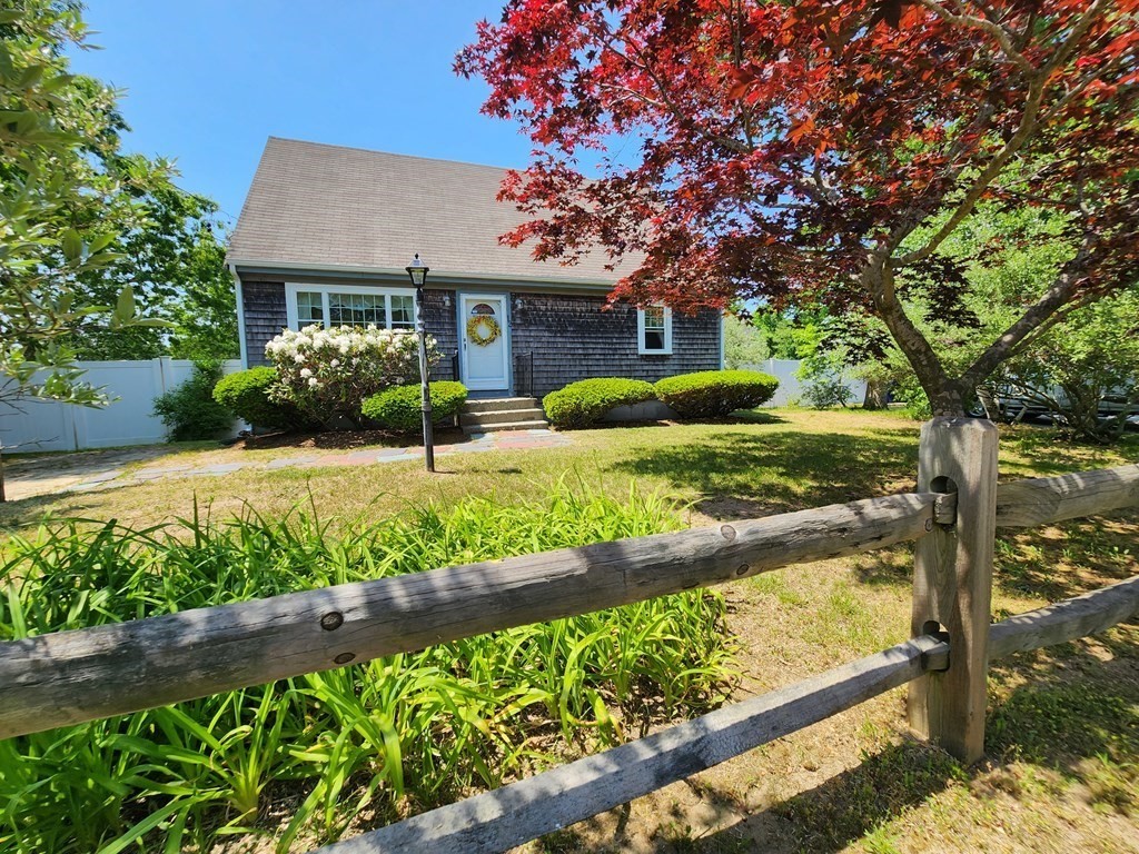 12 Peaceful Lane Wareham, MA 02538 - Photo 32 of 41 a front view of a house with a yard