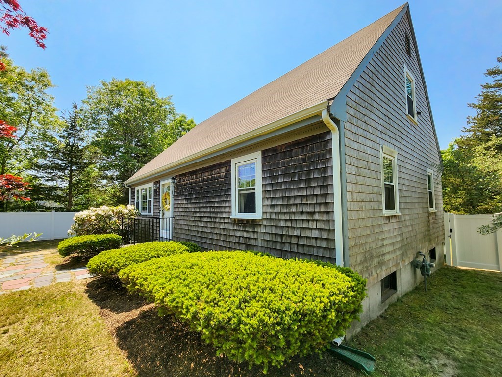 12 Peaceful Lane Wareham, MA 02538 - Photo 35 of 41 a view of a house with a yard