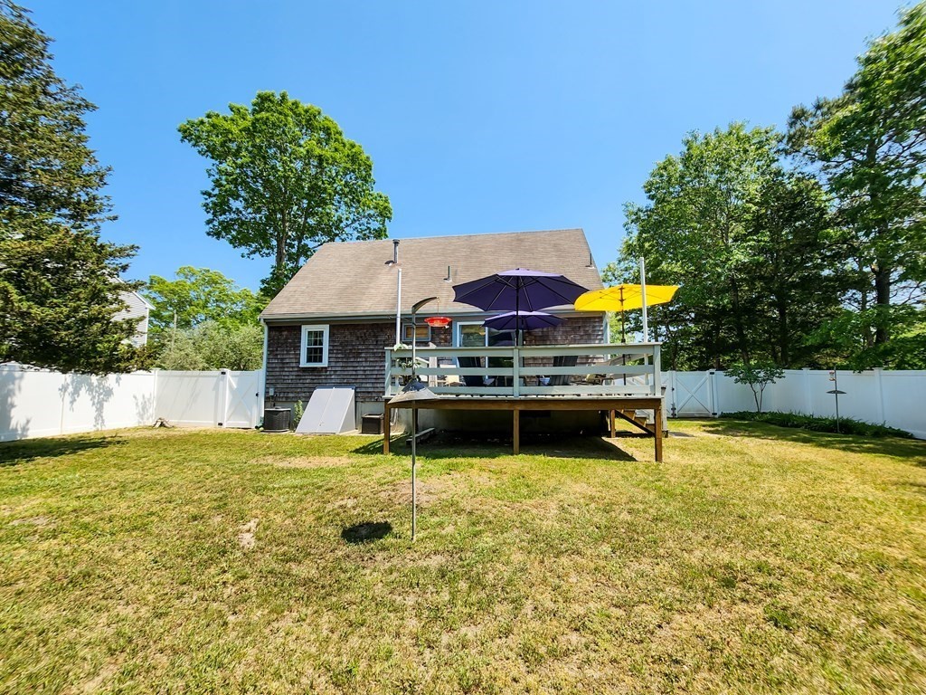 12 Peaceful Lane Wareham, MA 02538 - Photo 39 of 41 a view of swimming pool with lawn chairs under an umbrella