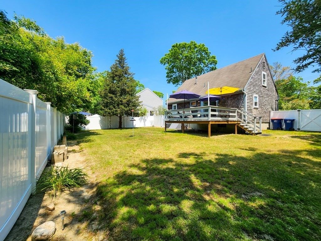 12 Peaceful Lane Wareham, MA 02538 - Photo 40 of 41 a view of a house with a backyard