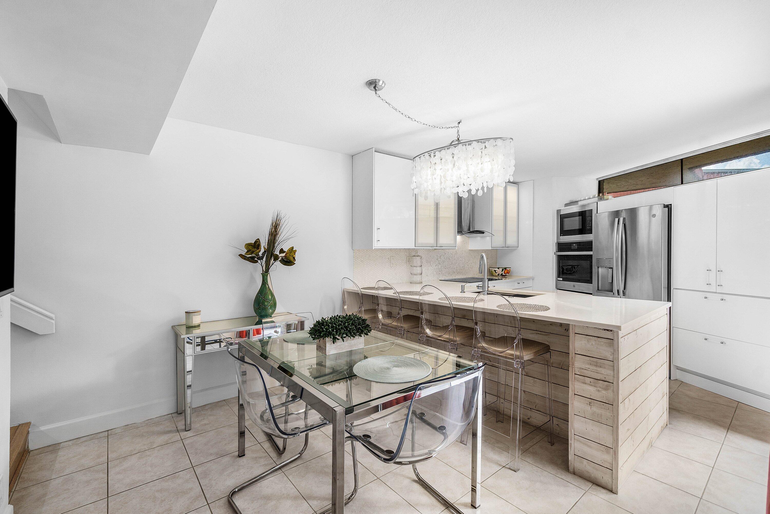 8122 Thames Boulevard, Unit C Boca Raton, FL 33433 - Photo 12 of 43 Kitchen Island -extra seating