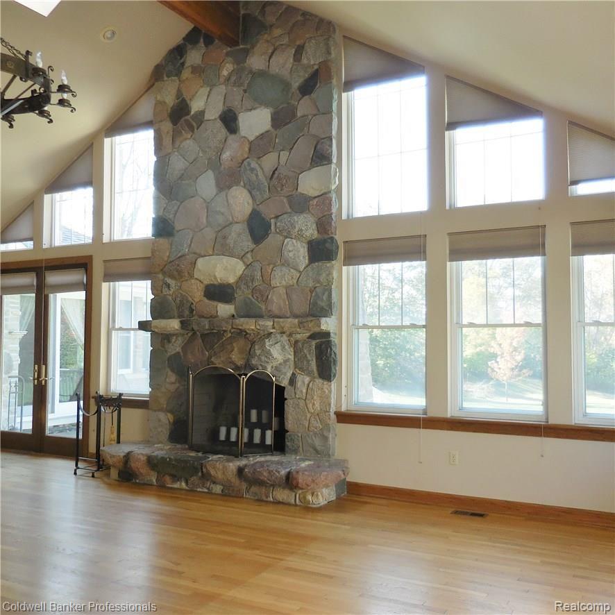 21591 Garfield Road Northville, MI 48167 - Photo 4 of 90 CUSTOM BUILT STONE FIREPLACE IN GREAT ROOM