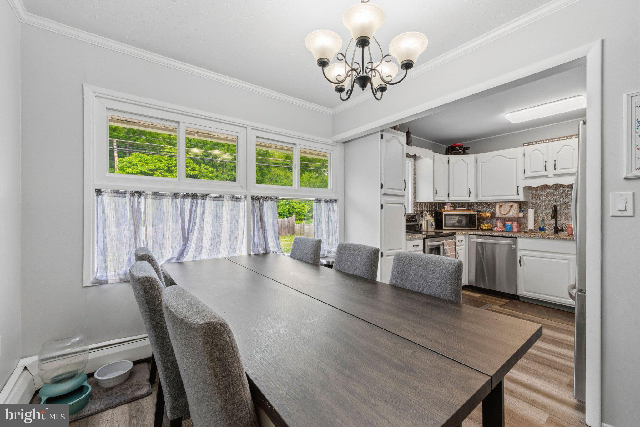 44 Quickset Road Levittown, PA 19057 - Photo 8 of 28 Bright dining space with garden views.