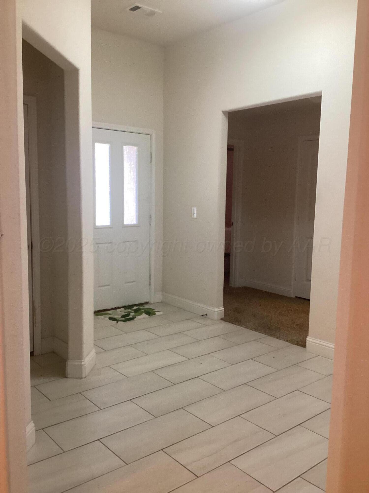 7206 Sinclair Street Amarillo, TX 79119 - Photo 2 of 21 a view of an empty room