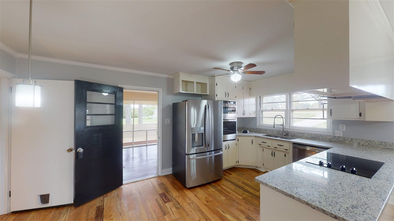 108 Rand Road Raleigh, NC 27603 - Photo 5 of 29 To the left under the light fixture is breakfast area. Photo does not show it well. Make an appointment to come check it out in person. To the right is the chef's delight kitchen. Breakfast area and Kitchen