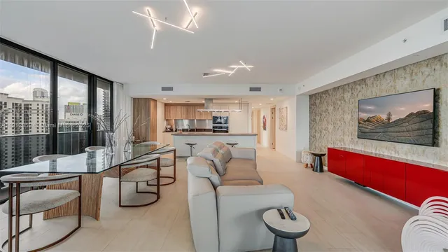 a living room with furniture and a table