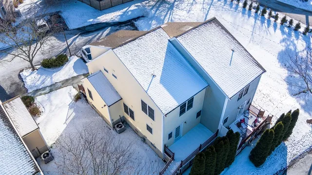 a view of an house with wooden stairs