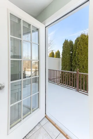 a view of balcony with furniture