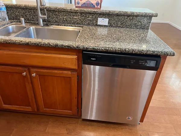 a close view of sink and microwave