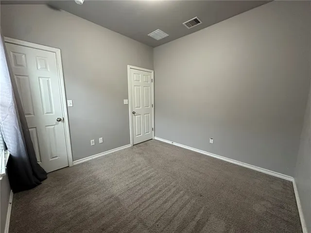 an empty room with closet
