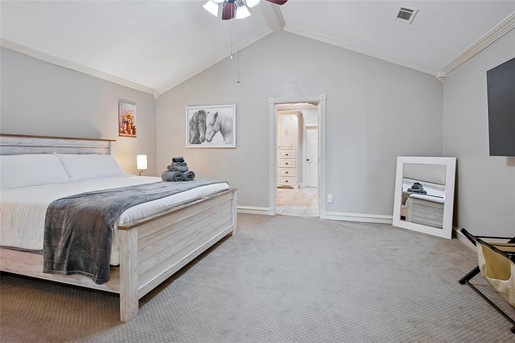 2309 Parker Road St. Paul, TX 75098 - Photo 16 of 40 a bed room with a bed and a chair
