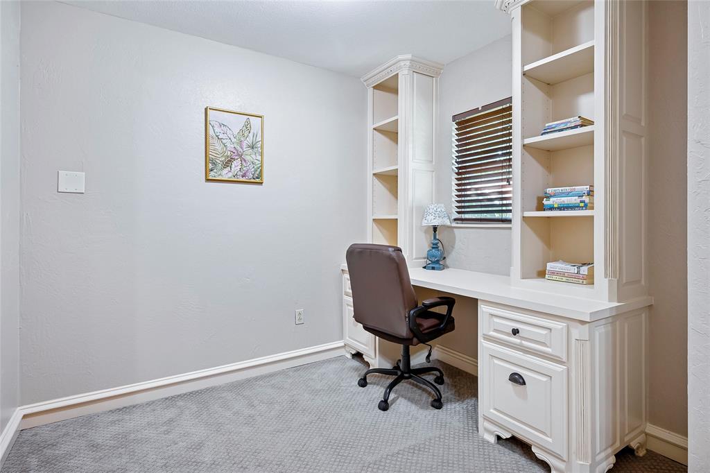 2309 Parker Road St. Paul, TX 75098 - Photo 18 of 40 a view of a workspace with furniture and a window