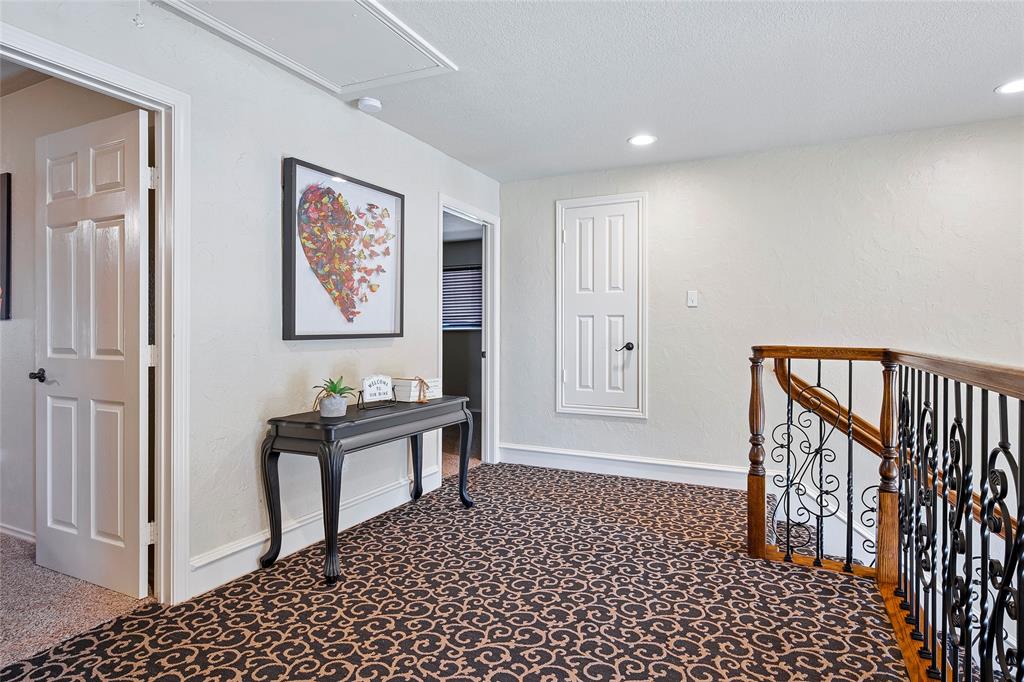 2309 Parker Road St. Paul, TX 75098 - Photo 26 of 40 a view of a hallway with seating area