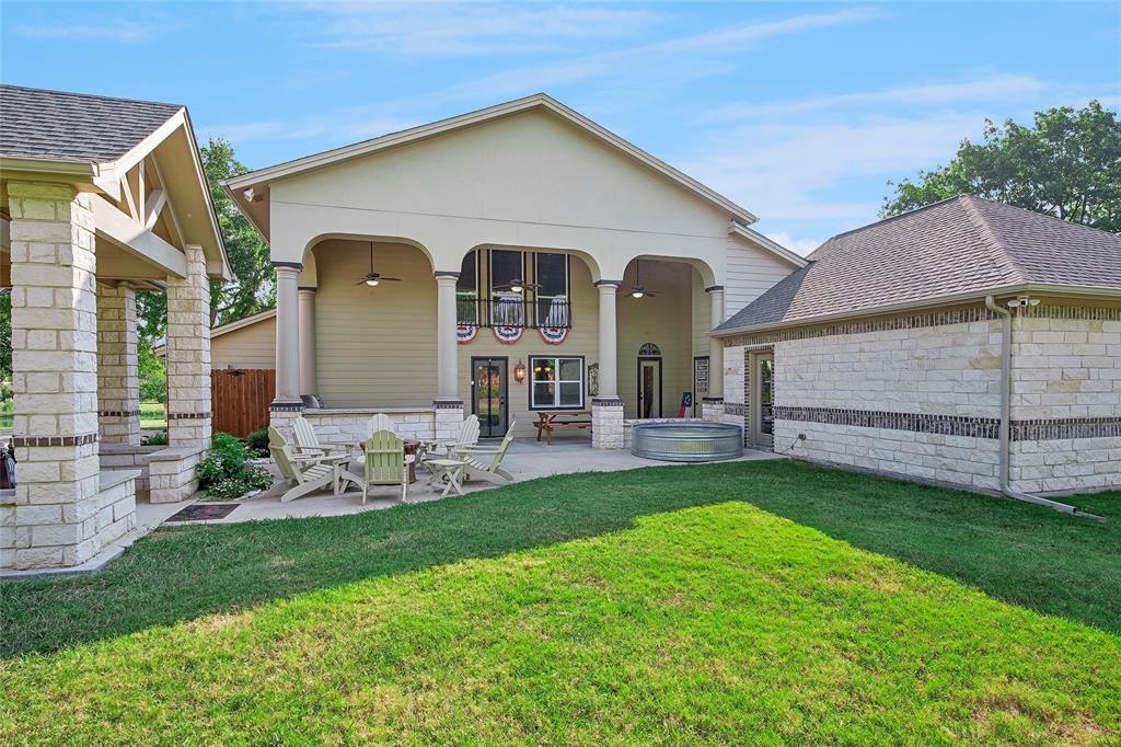 2309 Parker Road St. Paul, TX 75098 - Photo 33 of 40 a front view of a house with a yard and garage