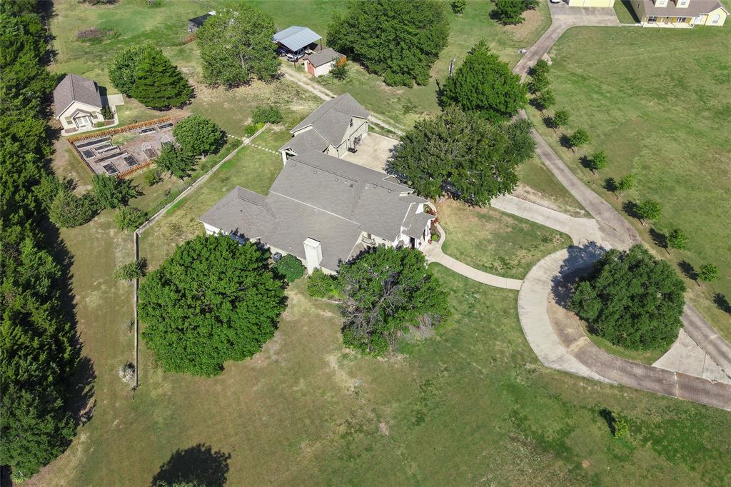 2309 Parker Road St. Paul, TX 75098 - Photo 40 of 40 an aerial view of a house with a yard and greenery