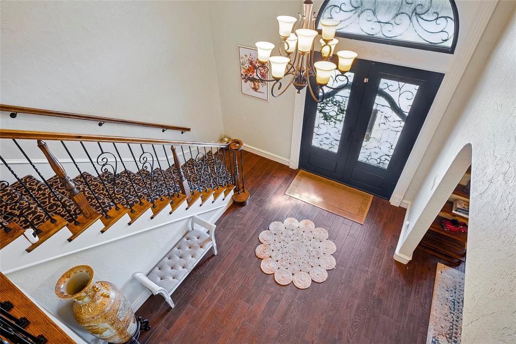 2309 Parker Road St. Paul, TX 75098 - Photo 5 of 40 a view of an entryway with wooden floor