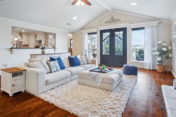 a bedroom with a large bed and a couch