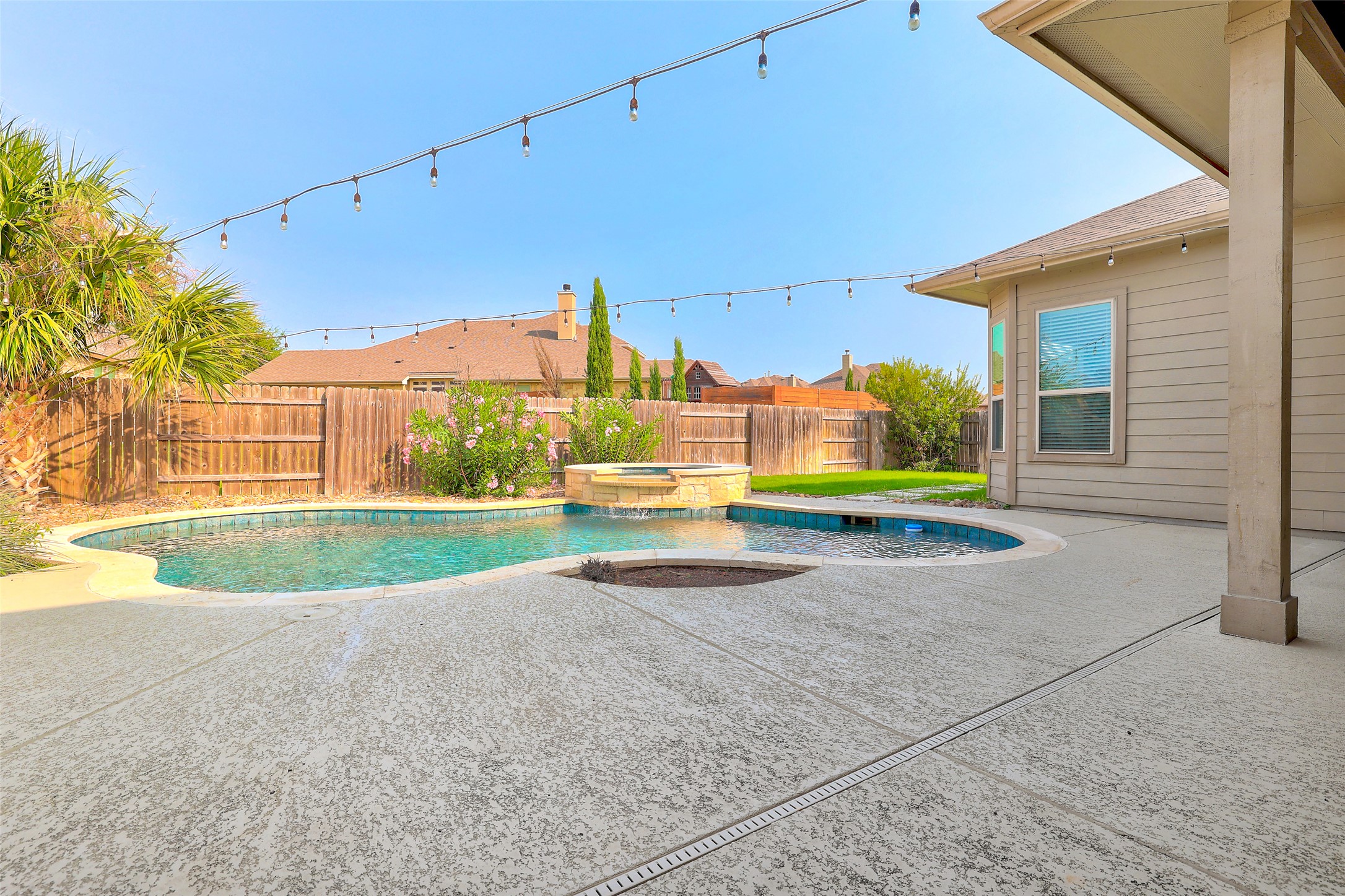 3020 Columbus Loop Round Rock, TX 78665 - Photo 36 of 40 Relaxing pool / spa featuring a patio and a fenced backyard