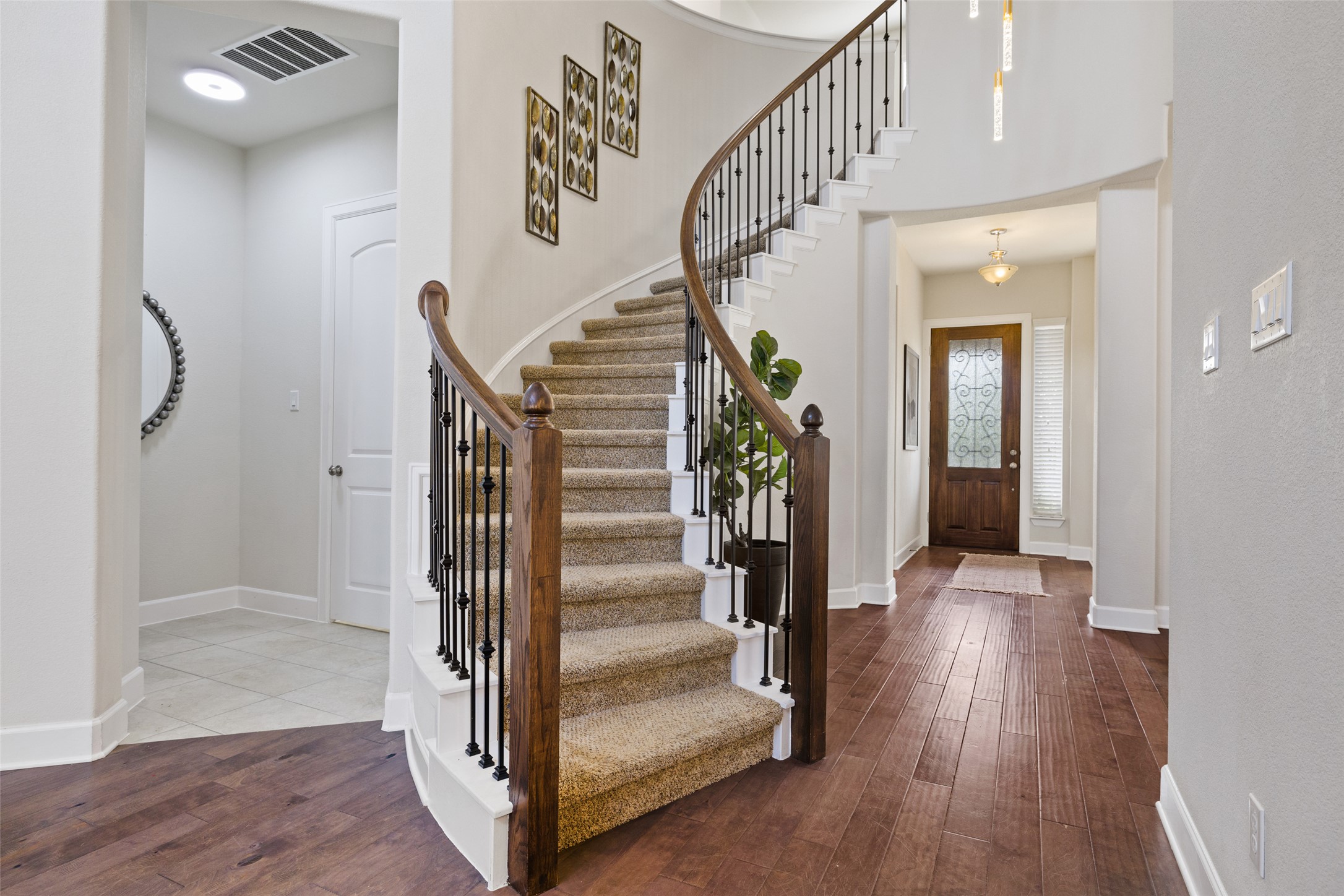 3020 Columbus Loop Round Rock, TX 78665 - Photo 10 of 40 Entryway featuring dark wood-style floors and a high ceiling