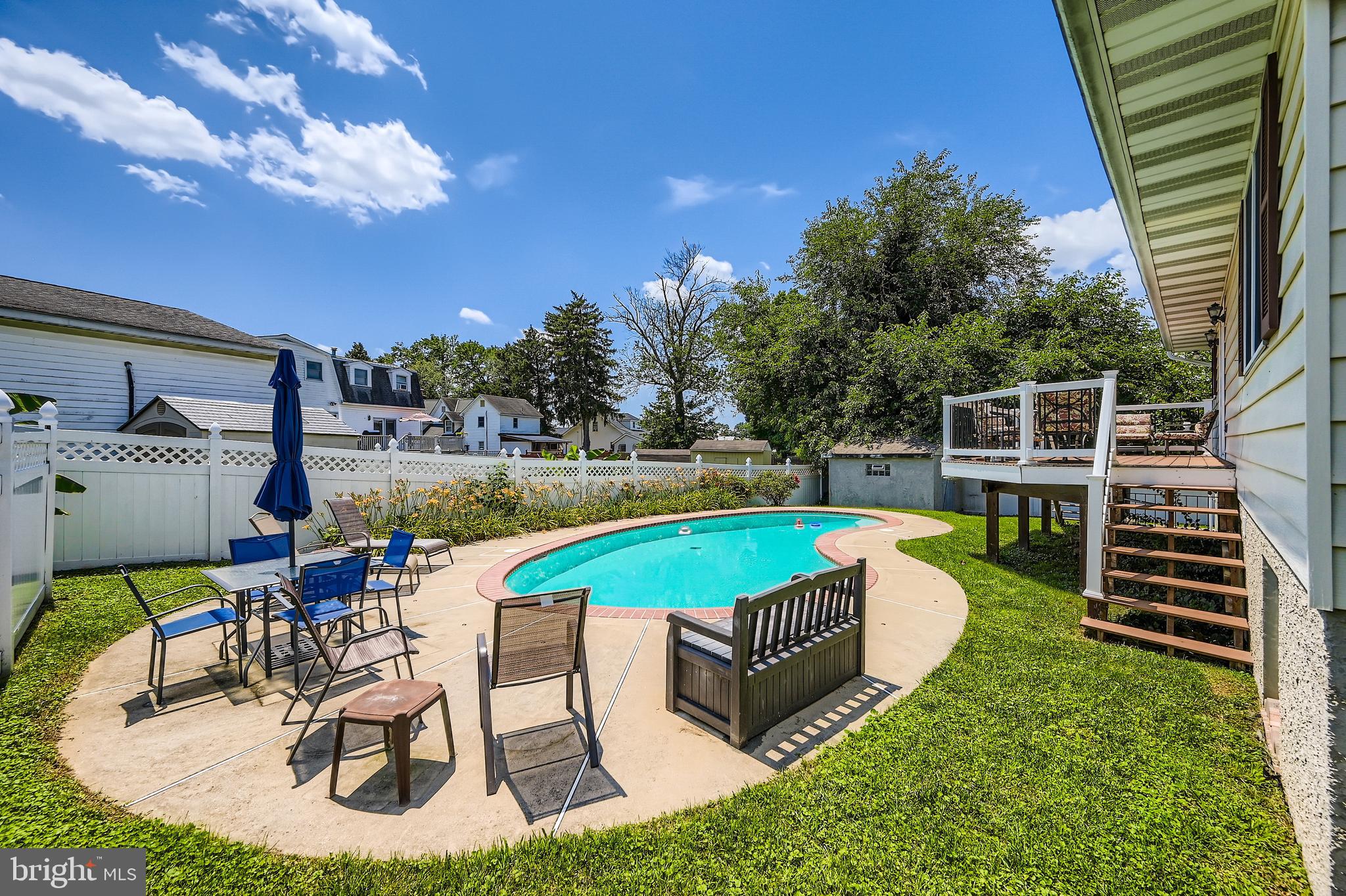 335 Poplar Road Baltimore, MD 21221 - Photo 30 of 34 swimming pool with outdoor seating and yard