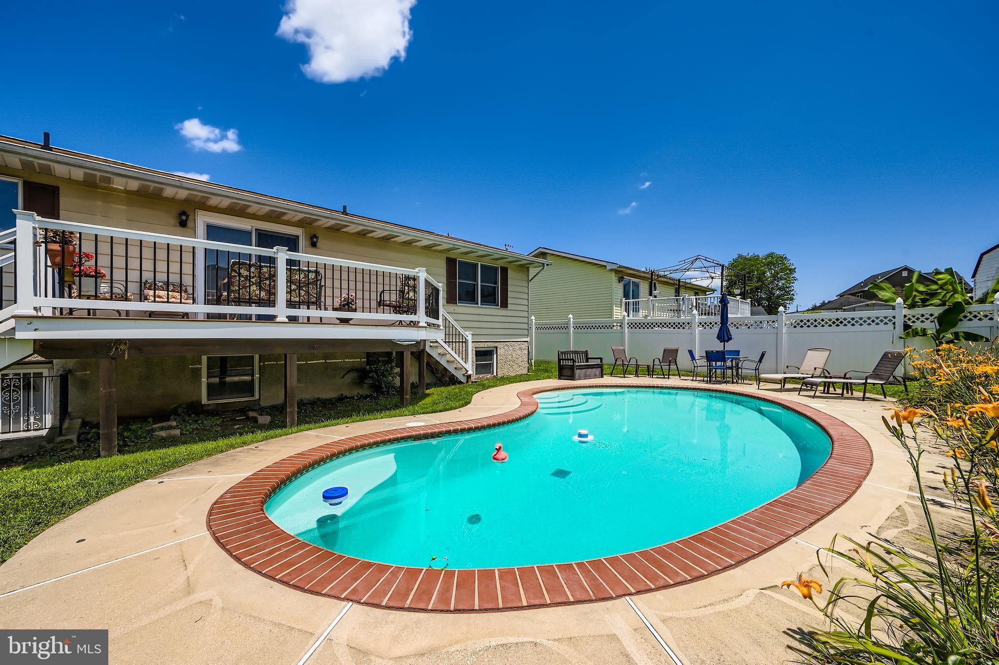 335 Poplar Road Baltimore, MD 21221 - Photo 32 of 34 a view of a swimming pool with a patio