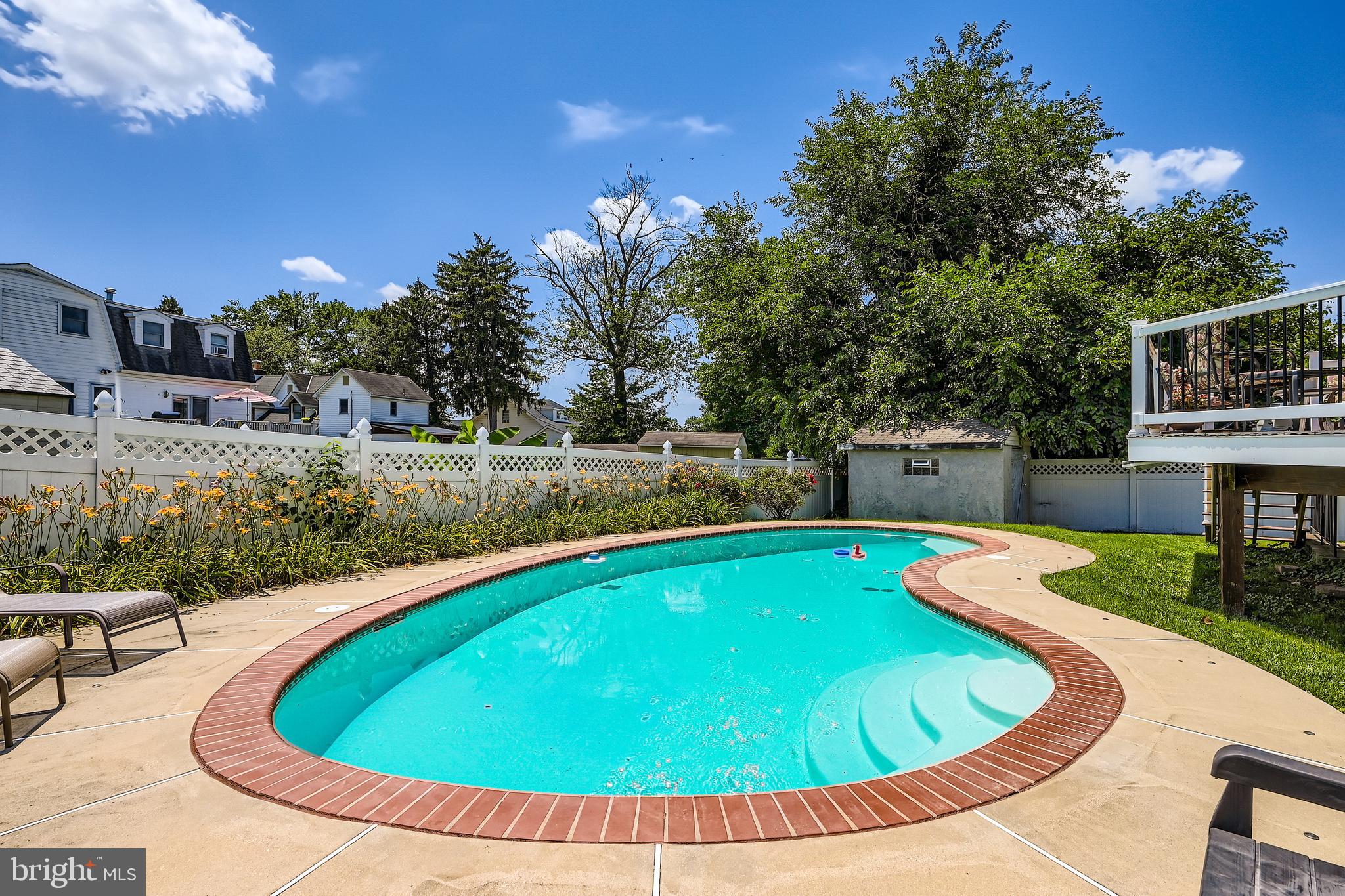 335 Poplar Road Baltimore, MD 21221 - Photo 34 of 34 a view of a swimming pool with a yard