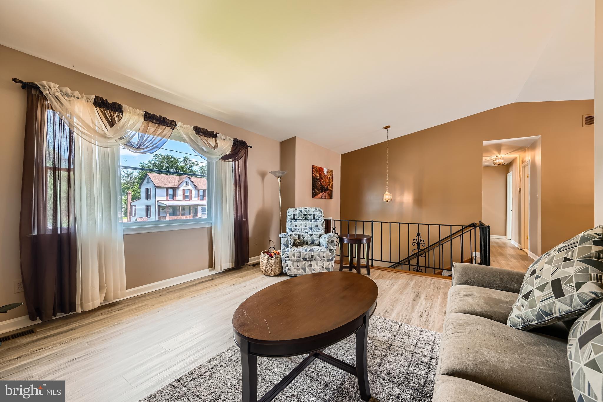 335 Poplar Road Baltimore, MD 21221 - Photo 5 of 34 a living room with furniture and a flat screen tv