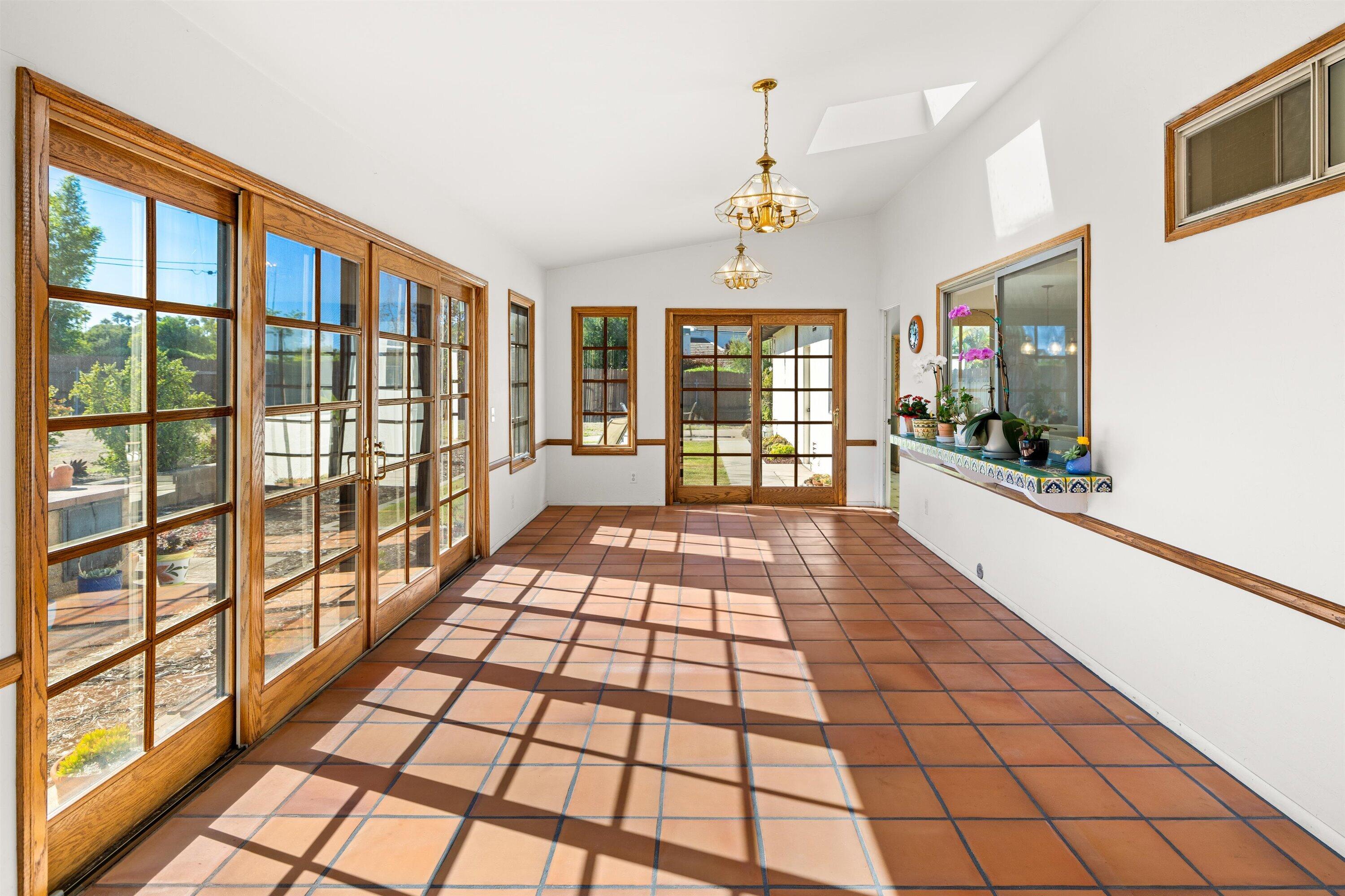 5187 Via Valverde Santa Barbara, CA 93111 - Photo 12 of 34 a view of a room with windows and chandelier
