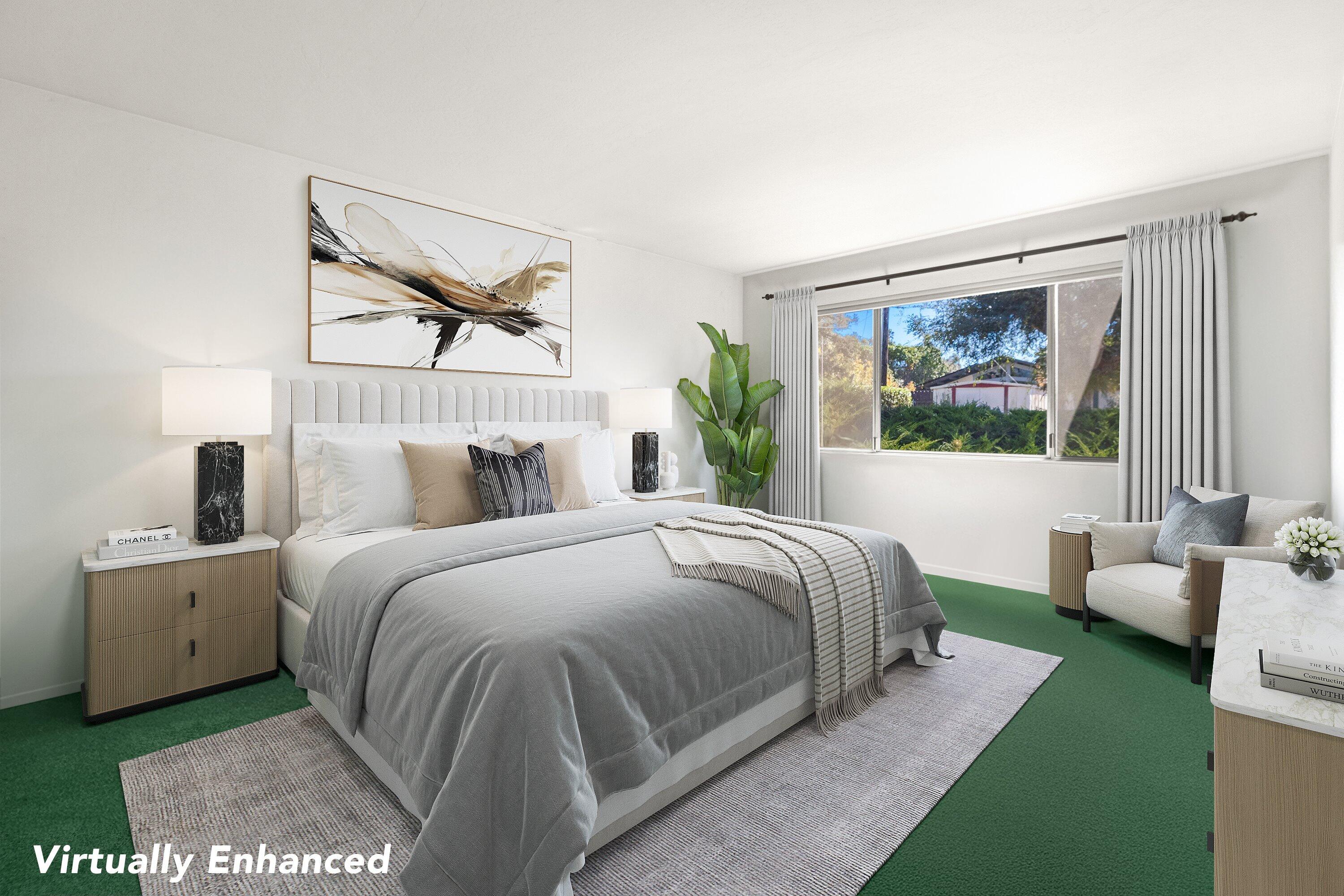 5187 Via Valverde Santa Barbara, CA 93111 - Photo 15 of 34 a bedroom with a bed and a painting on the wall