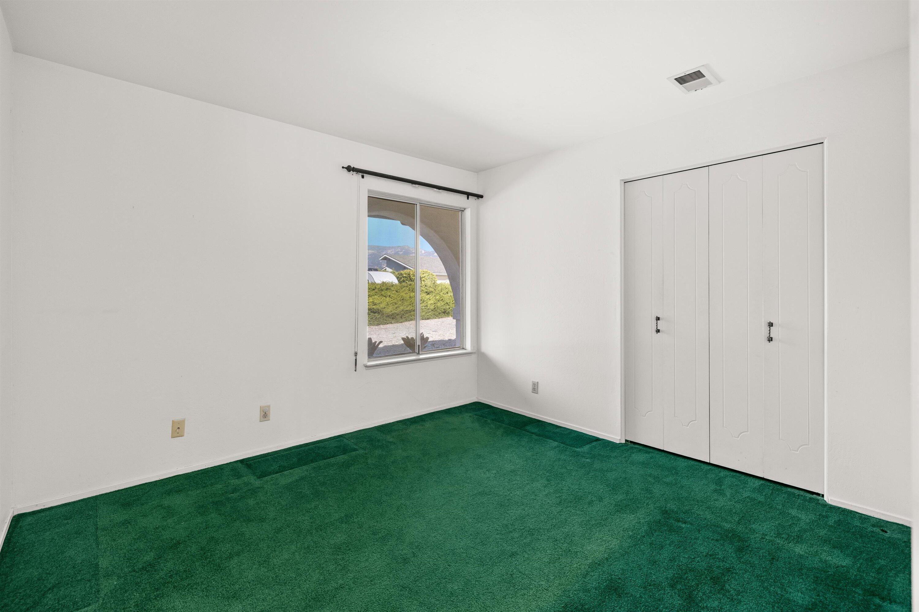 5187 Via Valverde Santa Barbara, CA 93111 - Photo 17 of 34 a view of room with window and garden