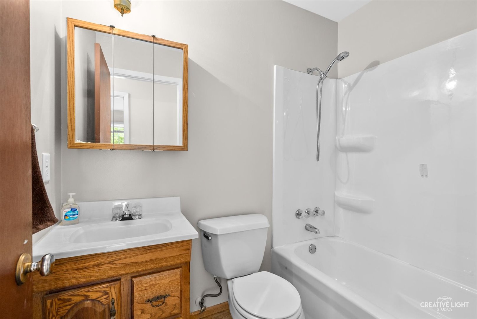 4 Pickford Road Montgomery, IL 60538 - Photo 14 of 17 a bathroom with a sink a toilet and shower
