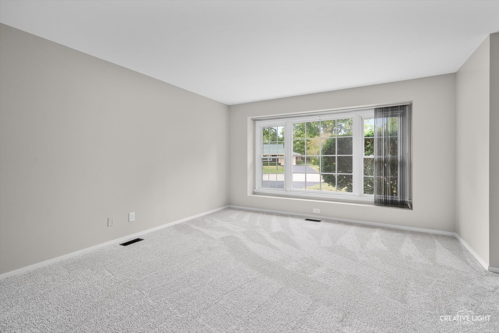 4 Pickford Road Montgomery, IL 60538 - Photo 2 of 17 a view of an empty room with a window
