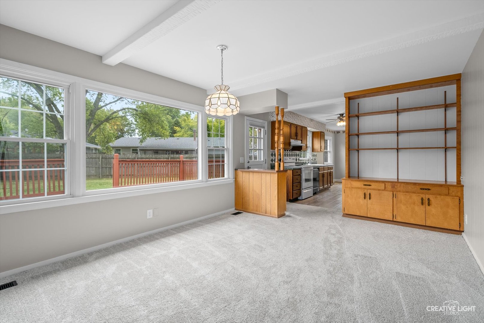 4 Pickford Road Montgomery, IL 60538 - Photo 4 of 17 a living room with furniture and a chandelier