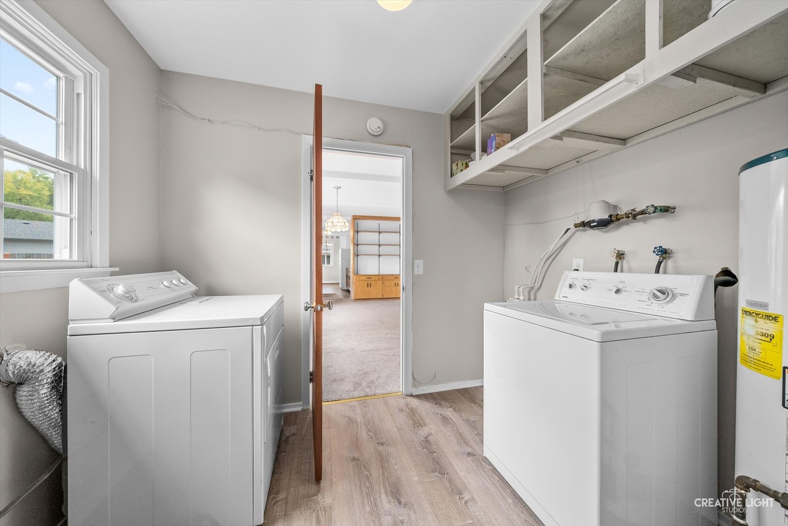 4 Pickford Road Montgomery, IL 60538 - Photo 9 of 17 a utility room with dryer and washer