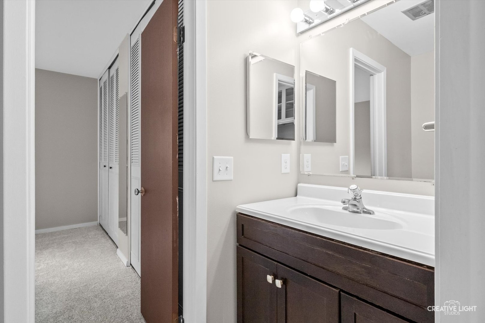 4 Pickford Road Montgomery, IL 60538 - Photo 10 of 17 a bathroom with a sink and a mirror