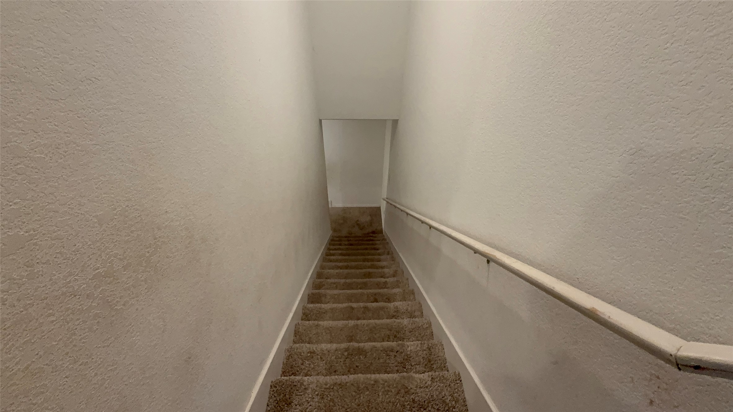 316 Geode Glen Maxwell, TX 78656 - Photo 12 of 24 a view of a hallway with stairs