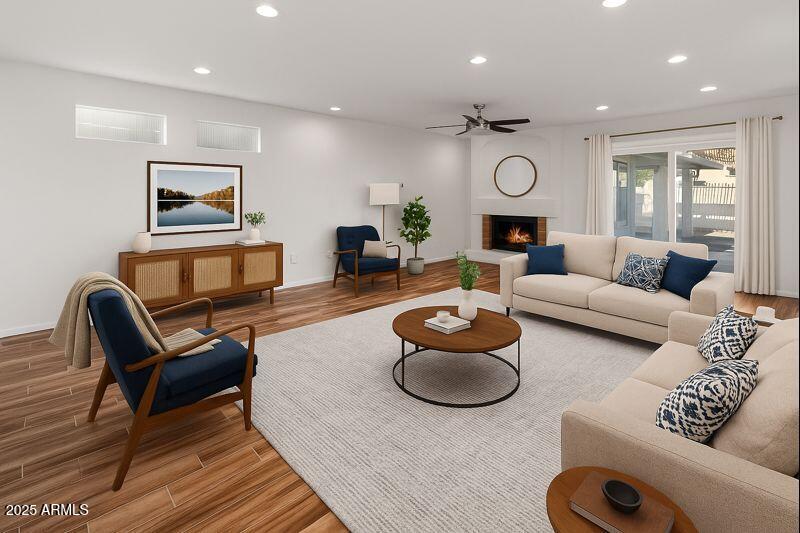 4652 East Piedmont Road Phoenix, AZ 85044 - Photo 1 of 30 a living room with furniture and a fireplace