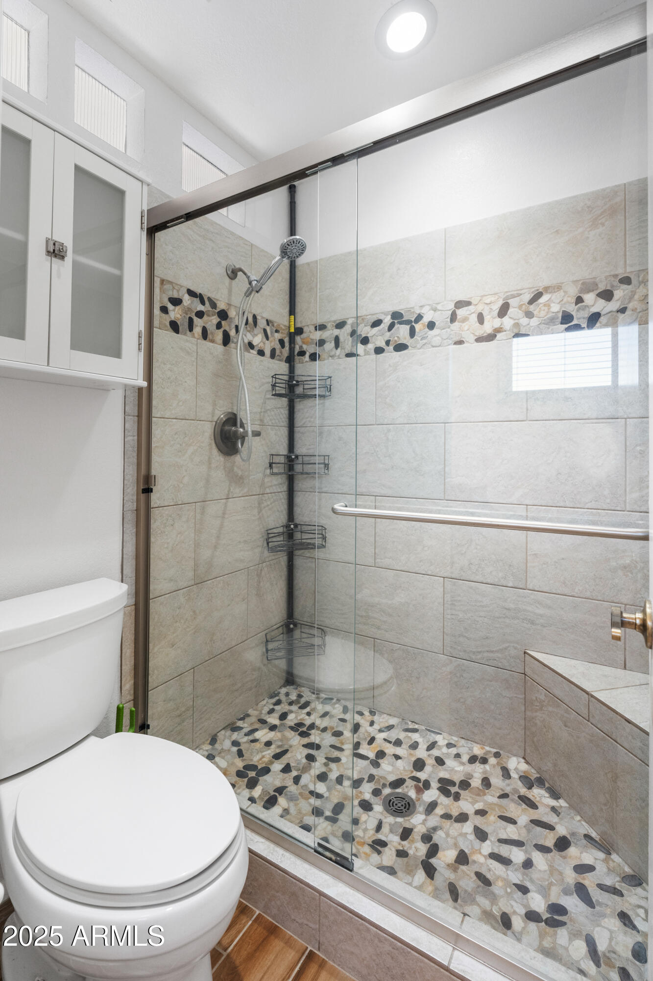 4652 East Piedmont Road Phoenix, AZ 85044 - Photo 16 of 30 a bathroom with a toilet and a shower