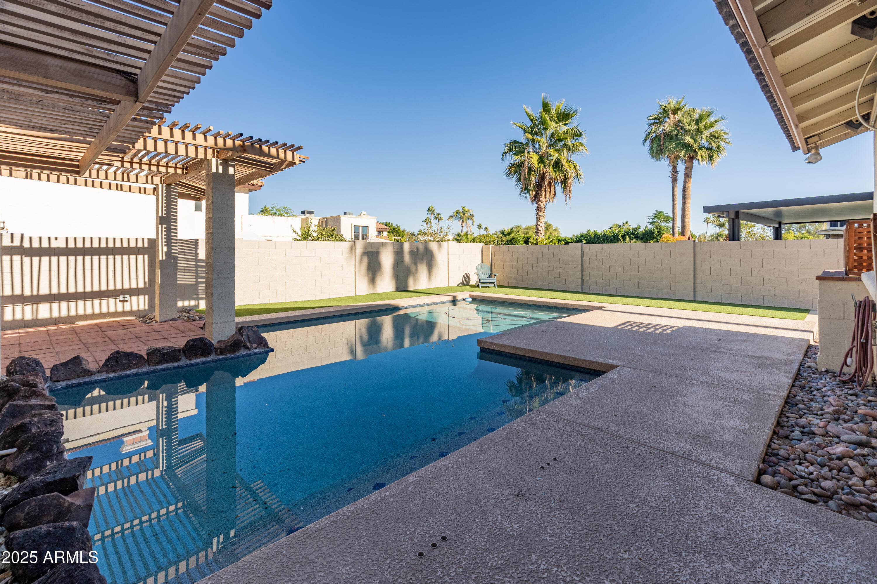 4652 East Piedmont Road Phoenix, AZ 85044 - Photo 18 of 30 a view of a patio with swimming pool