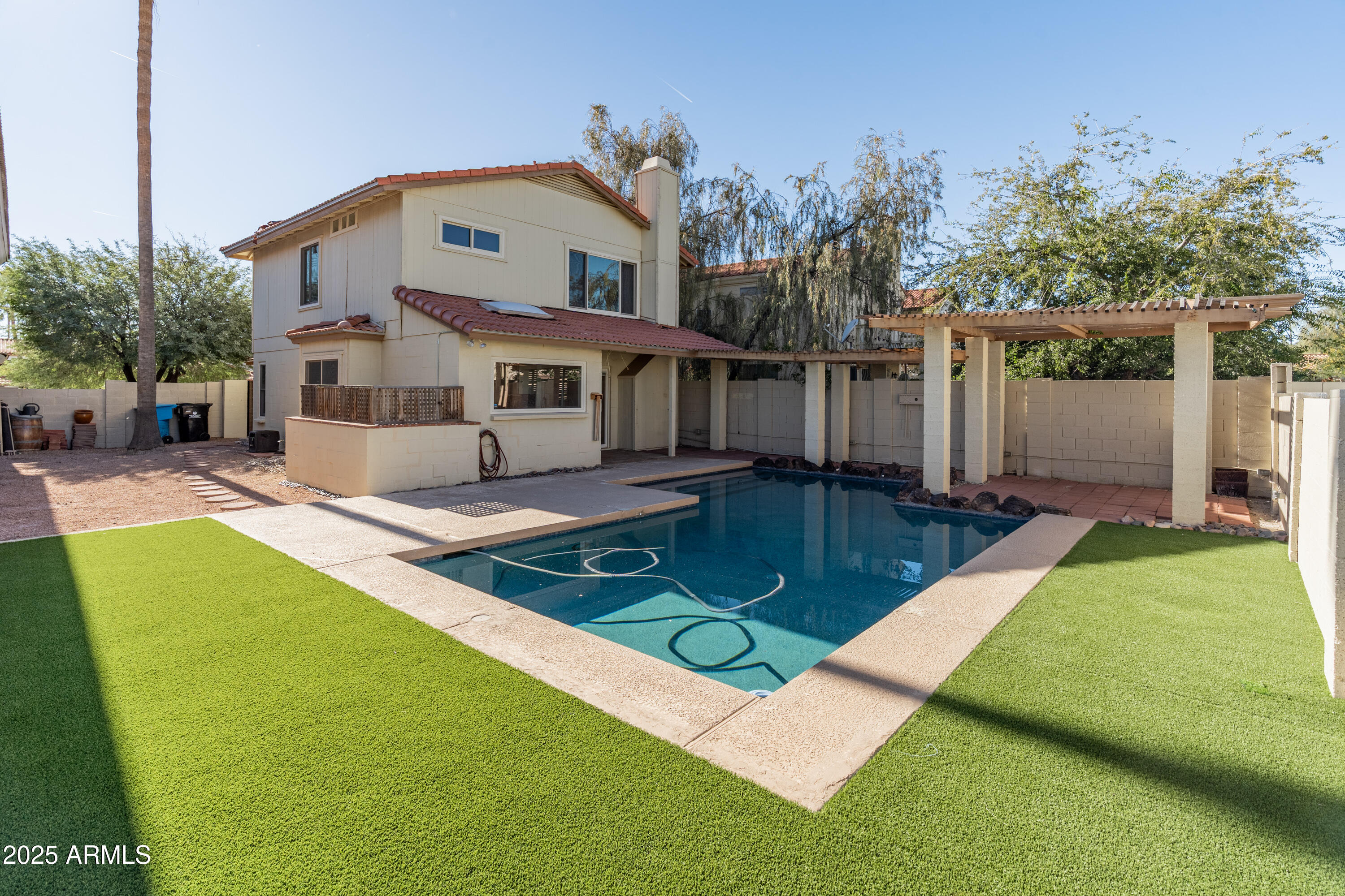 4652 East Piedmont Road Phoenix, AZ 85044 - Photo 21 of 30 a front view of house with yard and trees