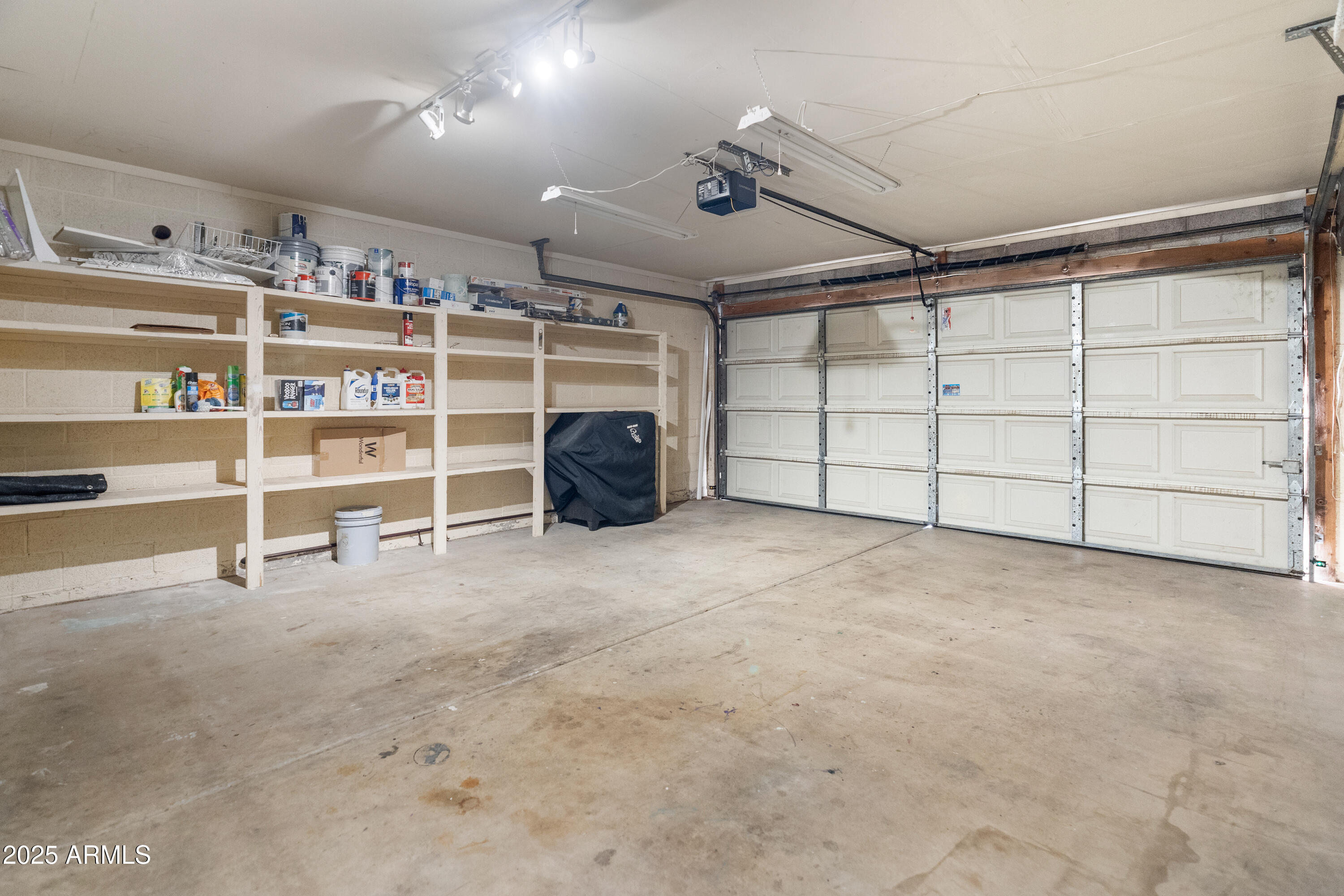 4652 East Piedmont Road Phoenix, AZ 85044 - Photo 24 of 30 a view of a big room with shelves