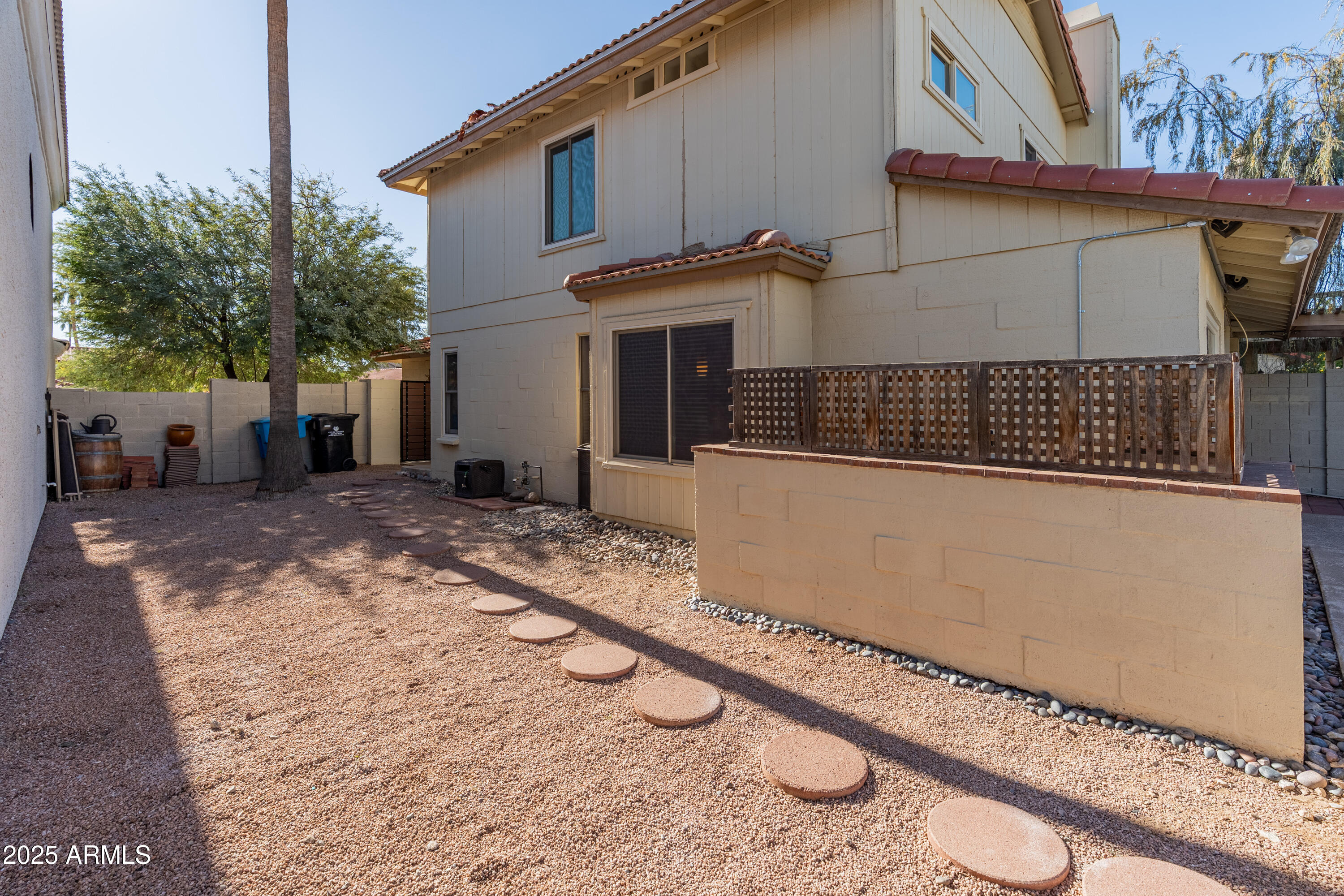 4652 East Piedmont Road Phoenix, AZ 85044 - Photo 27 of 30 a view of a house with a snow on the road