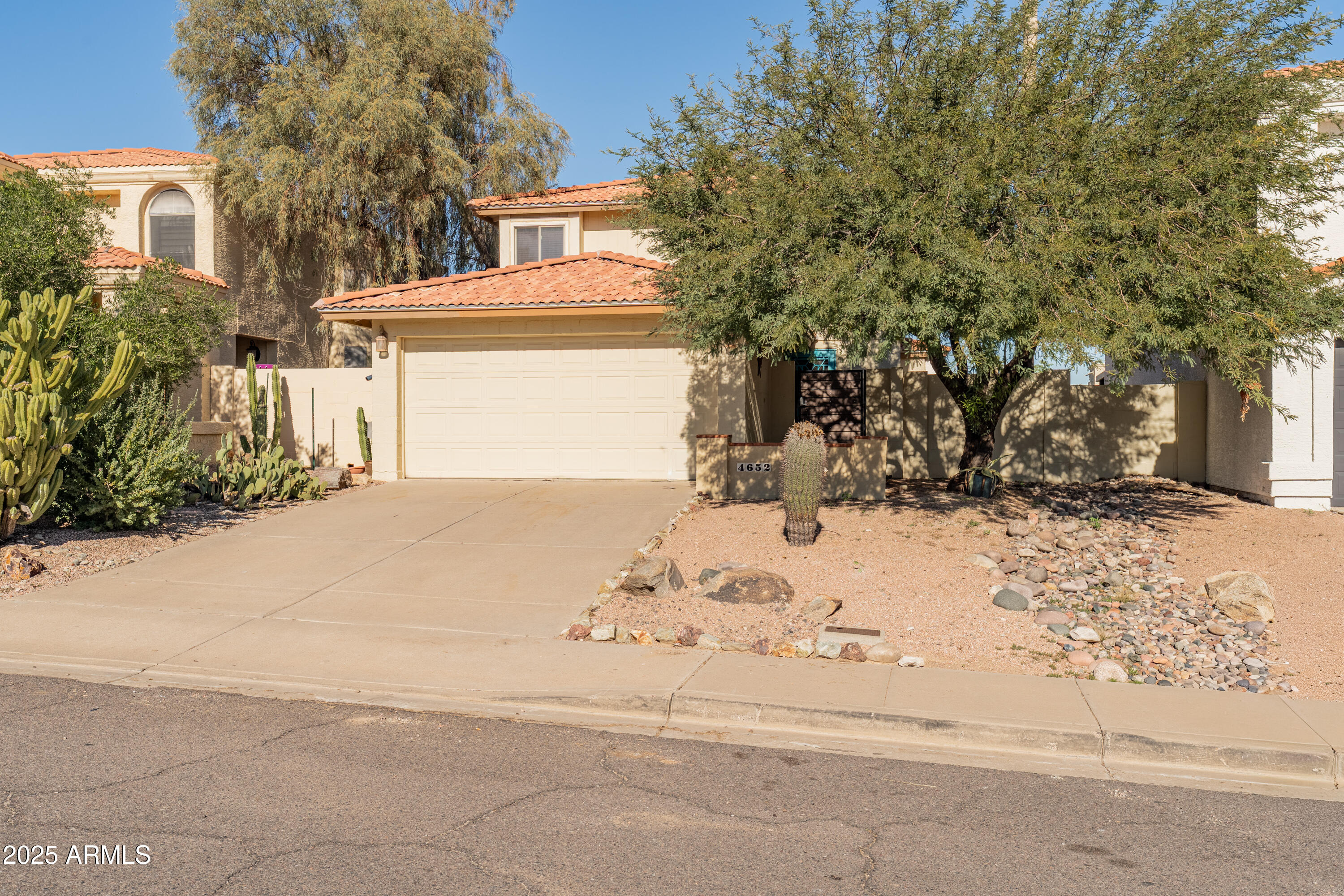 4652 East Piedmont Road Phoenix, AZ 85044 - Photo 30 of 30 a view of a house covered in snow