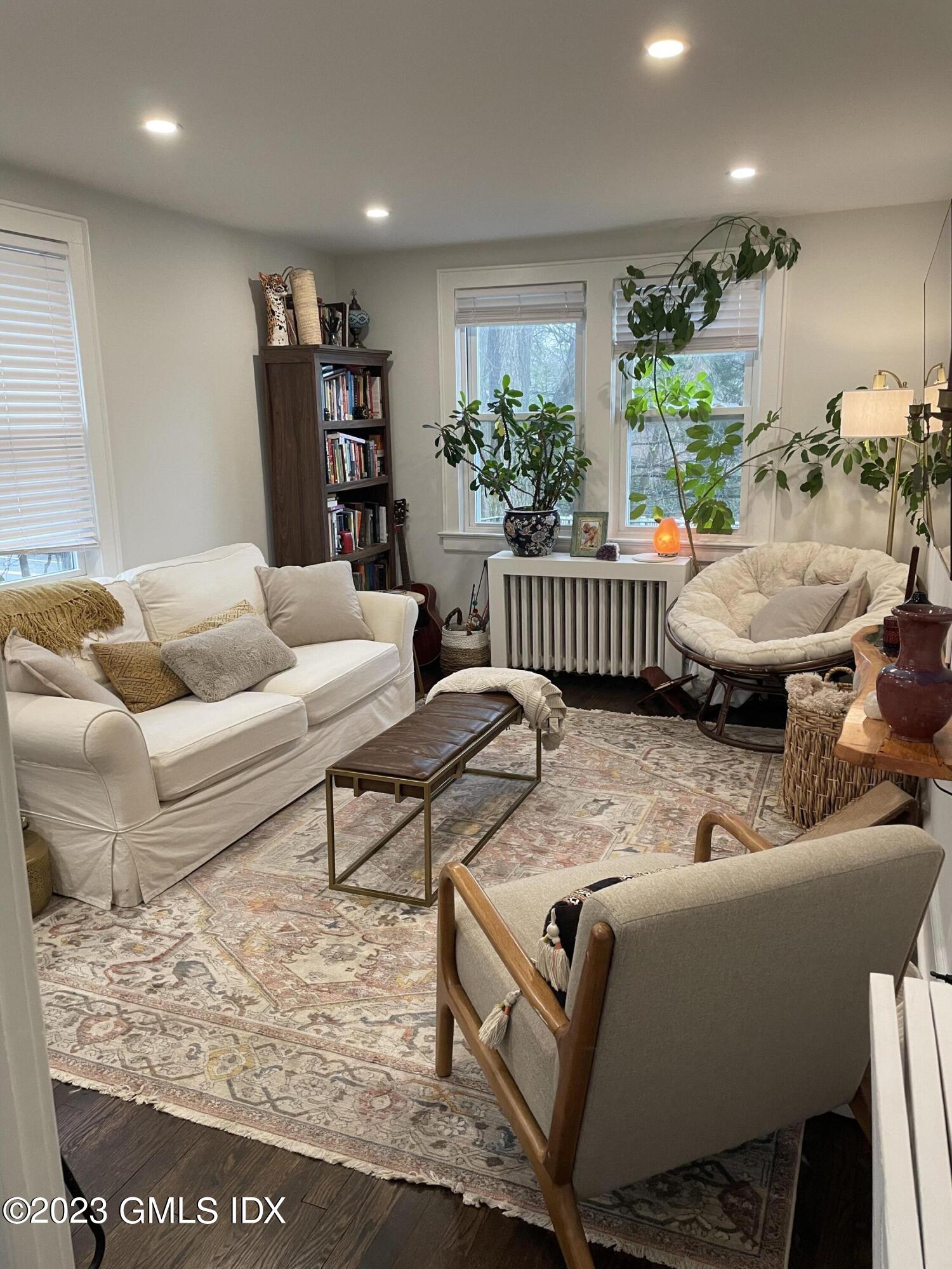 60 Weaver Street, Unit 2 Greenwich, CT 06831 - Photo 8 of 20 a living room with furniture