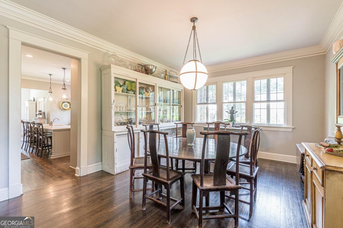 1878 Cambridge Avenue Atlanta, GA 30337 - Photo 20 of 84 a view of a dining room with furniture window and wooden floor